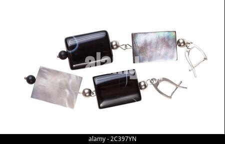 handmade silver earrings from polished agate and iridescent nacre beads isolated on white background Stock Photo