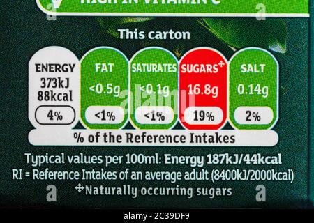 nutritional information traffic light system labelling with colour coded system on carton of Sainsburys SO organic Orange Juice from concentrate drink Stock Photo