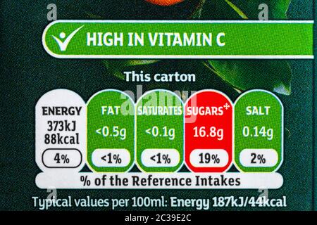 nutritional information traffic light system labelling with colour coded system on carton of Sainsburys SO organic Orange Juice from concentrate drink Stock Photo