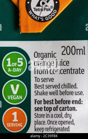 Information on carton of Sainsburys SO organic Orange Juice from concentrate drink Stock Photo