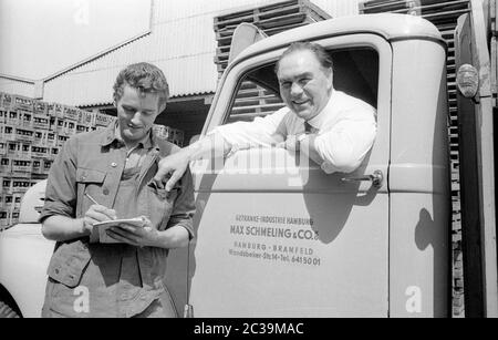 Max Schmeling at his company in 1966. He operated a chief agency for Coca Cola products in Hamburg-Bramfeld. Stock Photo