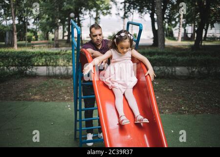 Little Girl Sliding Down Slide Playground Stock Photo 563274928