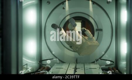 astronaut inside the orbital space station Stock Photo