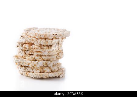 Pile of puffed rice cakes isolated on white background Stock Photo