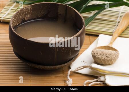 Kava drink made from the roots of the kava plant mixed with water Stock Photo