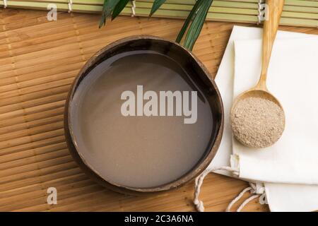 Kava drink made from the roots of the kava plant mixed with water Stock Photo