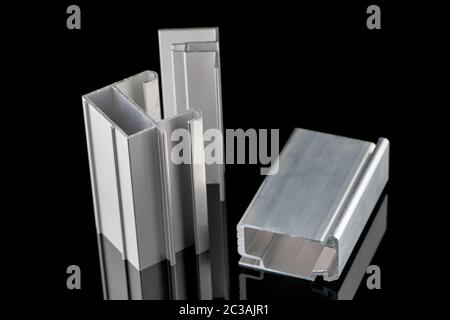 Aluminum profile sample isolated on black background. Stock Photo