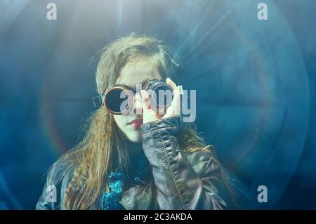 Beautiful steampunk teen girl  over vintage background Stock Photo