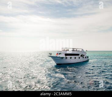 white cruise tourist boat in the Red Sea in Egypt Stock Photo