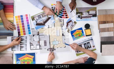 Architects And Designers Working On Color Selection For House Stock Photo