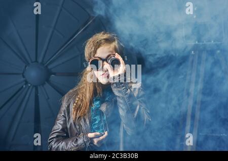 Beautiful steampunk teen girl  over vintage background Stock Photo