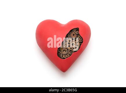 Red mechanical heart over white background with clipping path Stock Photo