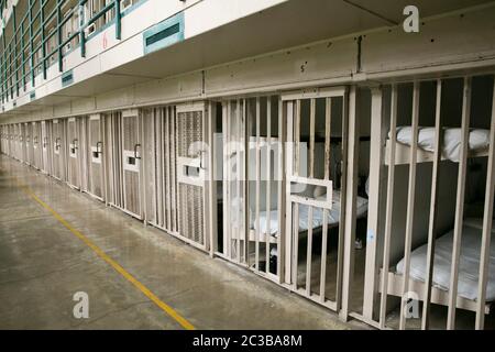 Rosharon Texas USA, August 25 2014: Cellblock shows empty cells with two cots in each barred enclosure at the high-security Darrington state prison.  ©Marjorie Kamys Cotera/Daemmrich Photography Stock Photo