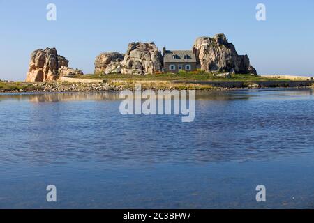 famous house on the rocks at ploumenach, cote de granit rose, cotes d'armor brittany, france Stock Photo