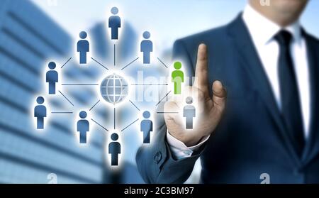 Network concept is shown by businessman. Stock Photo