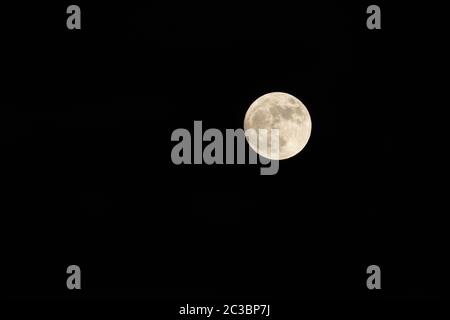 Detailed and isolated full moon on deep black space Stock Photo