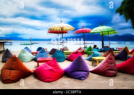 Colourful and comfortable seat cushions at the beach Gili Islands