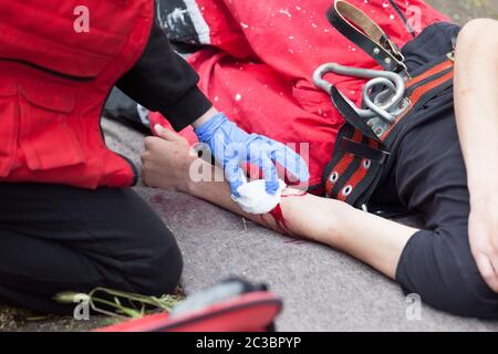 First aid after workplace accident Stock Photo