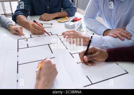 Elevated View Of An Architects Drawing Plan On Blueprint With Electrical Components Stock Photo