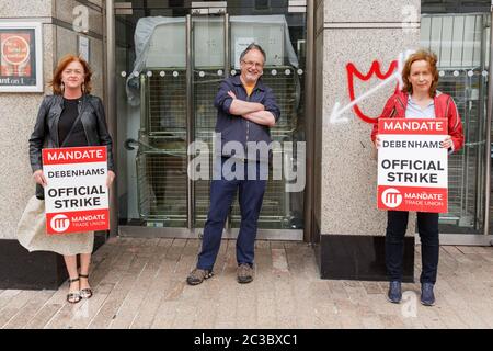 Cork, Ireland. 19th June, 2020. Pictured (LToR) is Carmel O Shea, Solidarity TD Mick Barry, and Deirdre Power. Former Debenhams Workers Strike, St Patricks Street, Cork City. Former Debanhams workers assembled once again today outside of the Debanhams Patricks Street store to protest in hopes of recieving a fair redundancy package. Support was shown by much of the public and some City Councillors and TDS. Credit: Damian Coleman/Alamy Live News Stock Photo