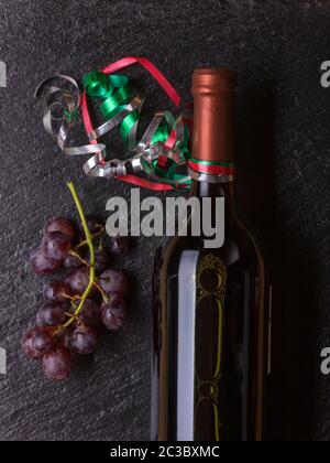 bottle of wine with grapes Stock Photo