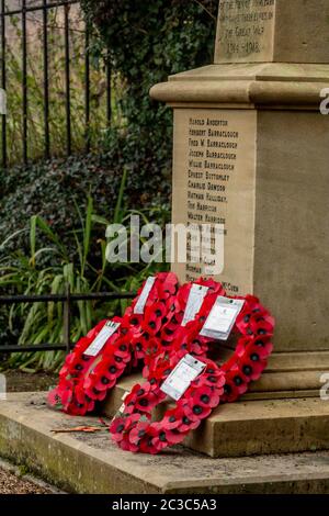 Poppy wreaths at Tong Park War Memorial, Baildon, Yorkshire, England. Stock Photo