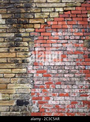 an old repaired exterior wall made of stone patched with bricks Stock Photo