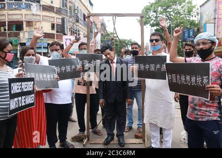 Kolkata, India. 19th June, 2020. West Bengal Congress political party supporters mass protest and dressed as Chinese President Xi Jinping gestures as he stands under a makeshift gallows during an anti-China demonstration in Kolkata. (Photo by Dipa Chakraborty/Pacific Press) Credit: Pacific Press Agency/Alamy Live News Stock Photo