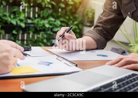 Business meeting  in outdoor. documents account managers crew working with new startup project Idea presentation, analyse marketing plans. Stock Photo