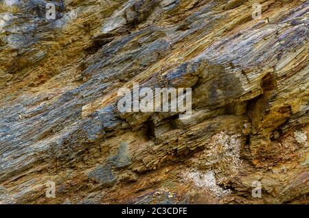 Yellow rock mountain background. Rock wall in Poland near Colored Lakes. Stock Photo