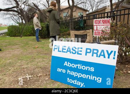 Several anti-abortion activists pray outside a South Austin clinic where abortions are performed as part of the pro-life campaign, '40 Days for Life.' ©MKC/Bob Daemmrich Photography, Inc.