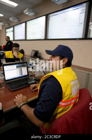 Austin, Texas USA, December 2013: Employees of the Texas Department of Public Safety and Texas Division of Emergency Management conduct an exercise to activate the full Emergency Management Council inside the newly renovated State Operations Center, which would be activated during emergencies and disasters.  ©Marjorie Kamys Cotera/Daemmrich Photography Stock Photo