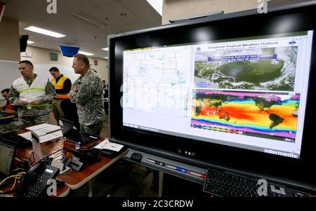 Austin, Texas USA, December 2013: Employees of the Texas Department of Public Safety and Texas Division of Emergency Management conduct an exercise to activate the full Emergency Management Council inside the newly renovated State Operations Center, which would be activated during emergencies and disasters.  ©Marjorie Kamys Cotera/Daemmrich Photography Stock Photo