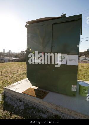 Austin Texas USA, February 12, 2014: Exterior of 330-square-foot dumpster where Huston Tillotson University environmental science professor Dr. Jeff Wilson plans to make his home for a full year. By living in the dumpster, he will experiment with innovative ways to live with less and practice low-waste living principles.   ©Marjorie Kamys Cotera/Daemmrich Photography Stock Photo