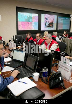 Austin, Texas USA, December 2013: Employees of the Texas Department of Public Safety and Texas Division of Emergency Management conduct an exercise to activate the full Emergency Management Council inside the newly renovated State Operations Center, which would be activated during emergencies and disasters.  ©Marjorie Kamys Cotera/Daemmrich Photography Stock Photo