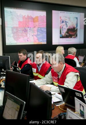 Austin, Texas USA, December 2013: Employees of the Texas Department of Public Safety and Texas Division of Emergency Management conduct an exercise to activate the full Emergency Management Council inside the newly renovated State Operations Center, which would be activated during emergencies and disasters.  ©Marjorie Kamys Cotera/Daemmrich Photography Stock Photo