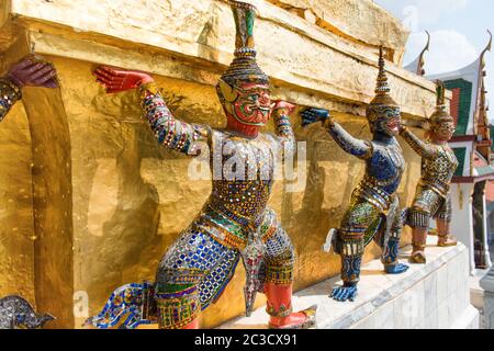 Statues of guards at Temple of Emerald Buddha in Bangkok