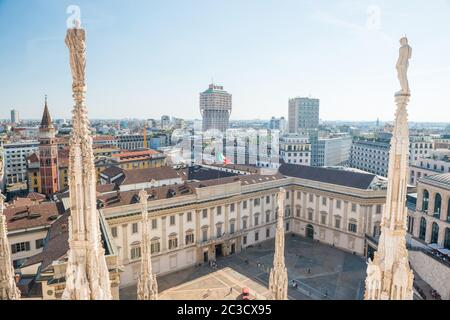 White statue on top of Duomo cathedral Stock Photo