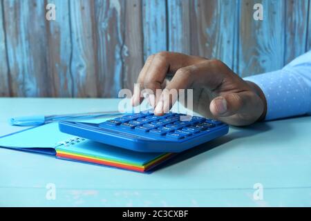 man hand using calculator on office desk  Stock Photo