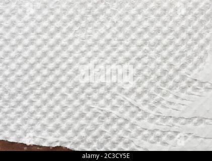 fragment of white tattered wrapping paper, full frame, close up Stock Photo