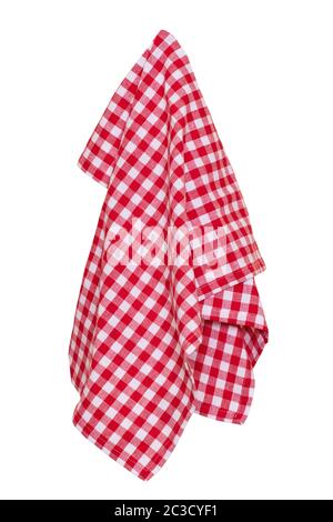 Towels isolated. Closeup of a red and white checkered napkin or tablecloth texture isolated on white background. Kitchen accessories. Macro photograph Stock Photo
