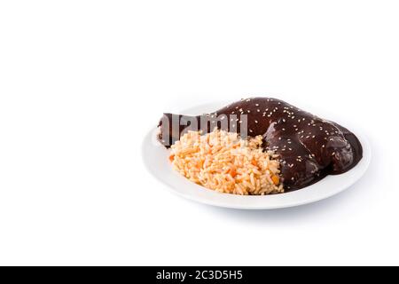Traditional mole Poblano with rice plate isolated on white background Stock Photo