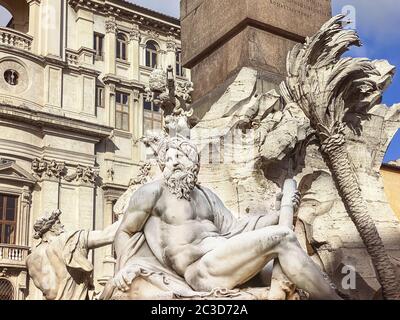 a seagull resting on the head of the statue representing the Ganges river in the Fountain of the fou Stock Photo