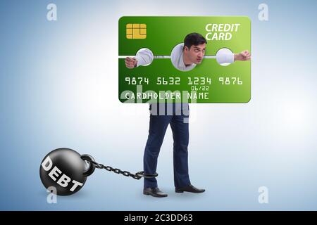 Businessman in credit card burden concept in pillory Stock Photo