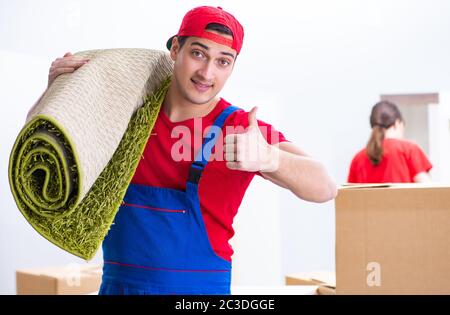 Professional movers doing home relocation Stock Photo