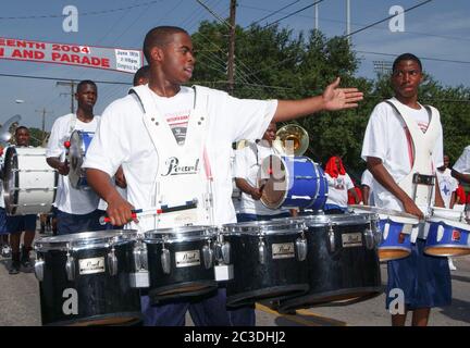 Austin, Texas, USA. 19th June, 2004. Austin, TX USA June 19, 2004: Annual Juneteenth parade in the historically black east Austin community celebrating the date June 19, 1865 when Galveston received word that President Lincoln had freed blacks from slavery. Credit: Bob Daemmrich/ZUMA Wire/Alamy Live News Stock Photo