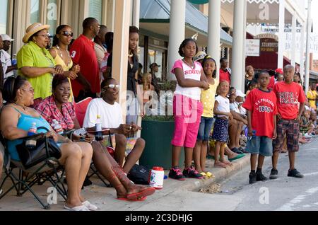 Bastrop, Texas, USA. 21st June, 2008. Bastrop, TX June 21, 2008: Parade-watchers in small-town at a Juneteenth celebration in the historically African-American suburb of Bastrop, outside Austin. Juneteenth celebrates the day, June 19, 1865 when Union soldiers landed in Galveston, TX announcing the end of slavery and the Civil War. Credit: Bob Daemmrich/ZUMA Wire/Alamy Live News Stock Photo