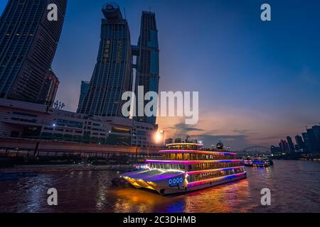 Ship cruising in Chongqing town at night Stock Photo