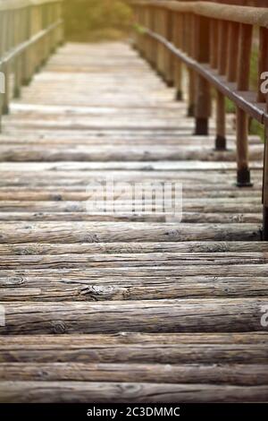 A Wooden Bridge Handmade Structure to Cross Over Stock Photo