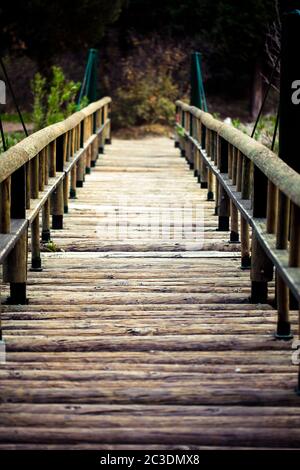 A Wooden Bridge Handmade Structure to Cross Over Stock Photo